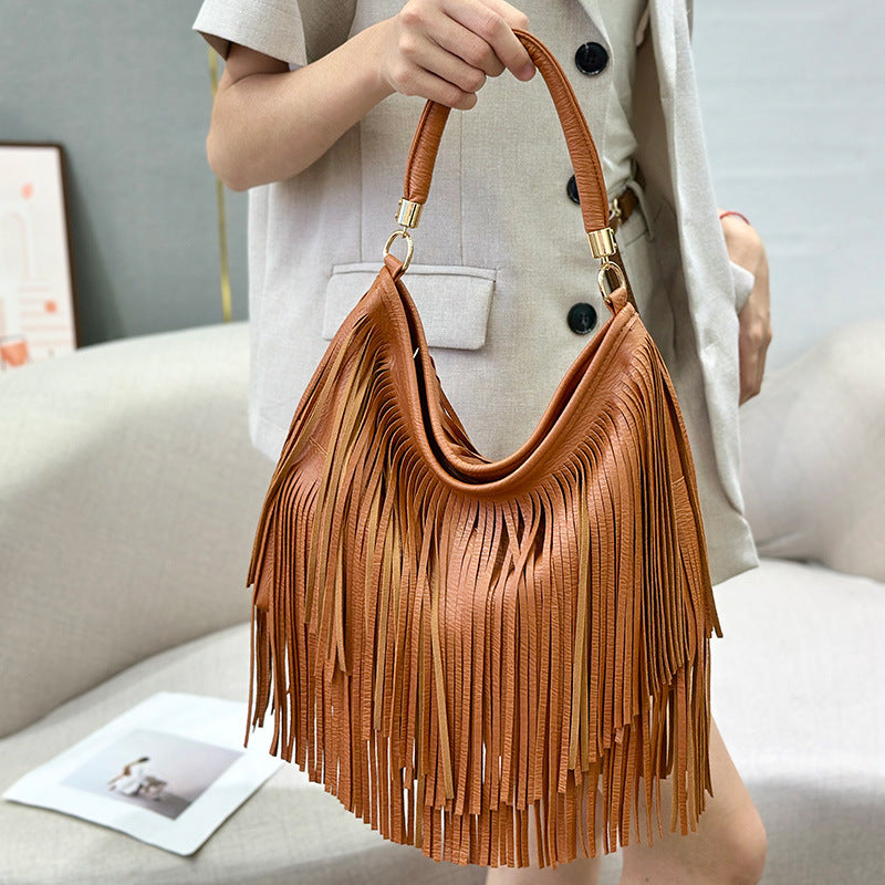 Bolso artesanal con flecos