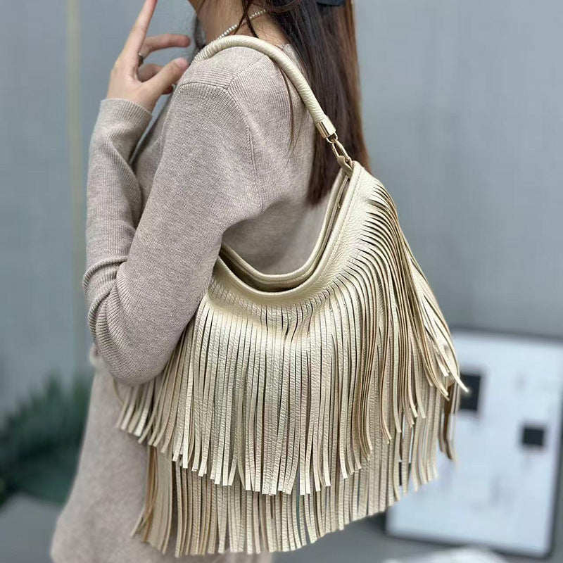 Bolso artesanal con flecos