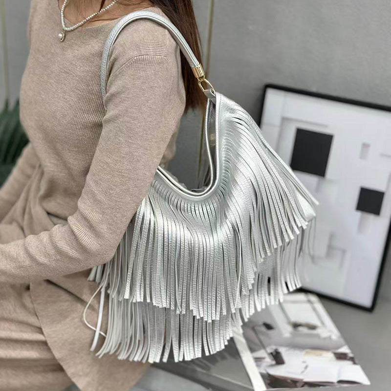 Bolso artesanal con flecos
