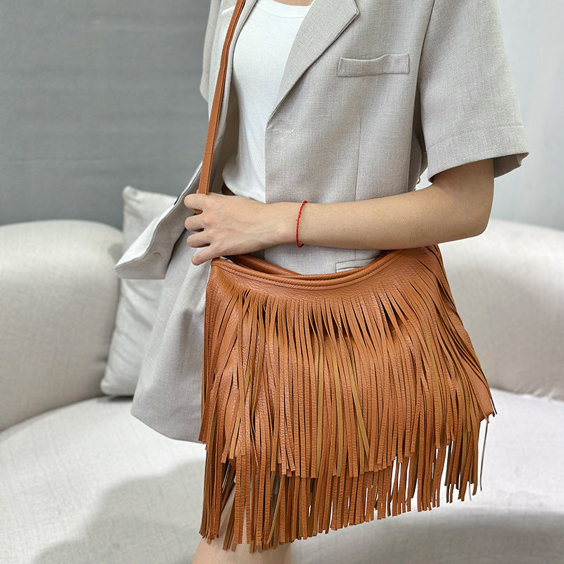 Bolso artesanal con flecos